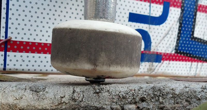 File:Street Wheel in Rail (Closeup).jpg